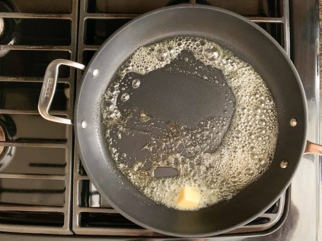 sizzling butter in a saute pan